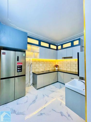 BÁN NHÀ 1 TRỆT 2 LẦU + 1 TẦNG SÂN THƯỢNG KDC THỚI NHỰT 1