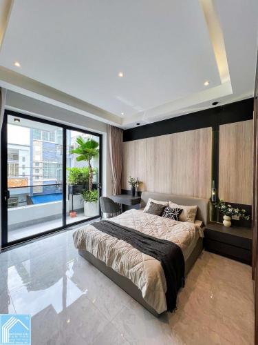 Bán Nhà 1 Trệt 2 Lầu Sân thượng đường B2 KDC 91B 