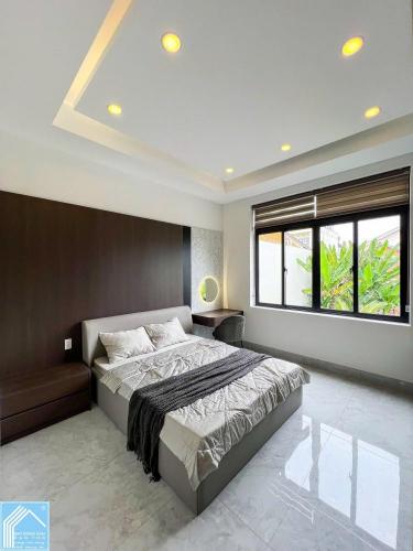 Bán Nhà 1 Trệt 2 Lầu Sân thượng đường B2 KDC 91B 