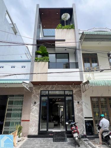 Bán Nhà 1 Trệt 2 Lầu Sân thượng đường B2 KDC 91B 