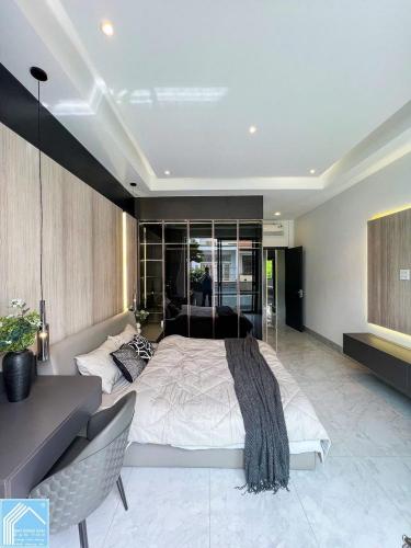 Bán Nhà 1 Trệt 2 Lầu Sân thượng đường B2 KDC 91B 