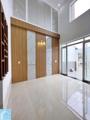 BÁN NHÀ 1T1Lửng, MẶT TIỀN - KDC Bình Nhựt (12Ha8). Đối  diện cổng TRƯỜNG HỌC