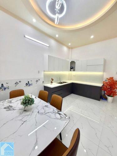 Bán nhà 1Trệt 1Lầu - mới đẹp. Trục Đường A2 - KDC Tổ 3A (đông đúc)
