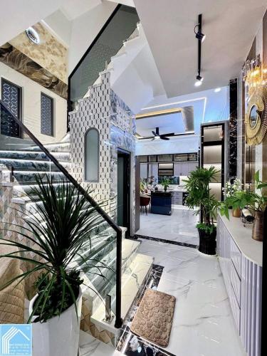 NHÀ PHỐ 1 TRỆT 3 LẦU MỚI XÂY KHU DÂN CƯ 91B 